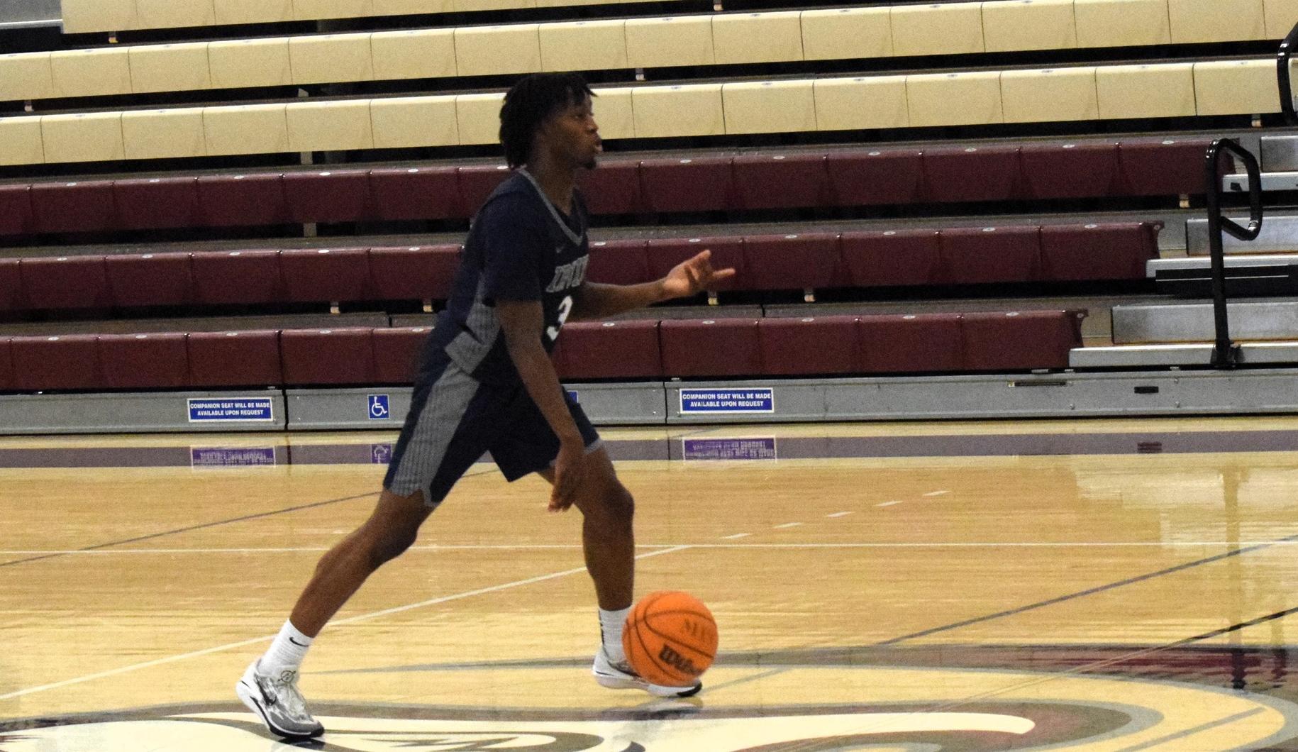 After solid first half, men's basketball team falls at RCC by five